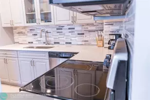 401 Golden Isles Dr, Hallandale Beach, FL 33009 - Photo 12