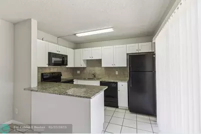 1660  Forest Lakes Cir, Unit #D, West Palm Beach, FL 33406 - Photo 12