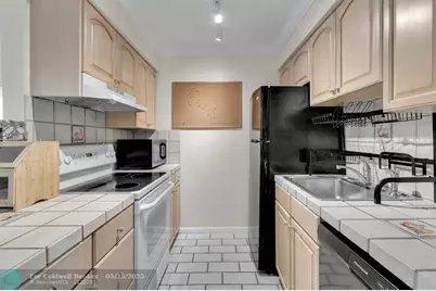 27  Crossings Cir, Unit #E, Boynton Beach, FL 33435 - Photo 16