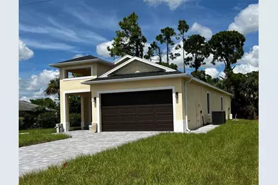 879  Sunrise Blvd, Lehigh Acres, FL 33974 - Photo 1