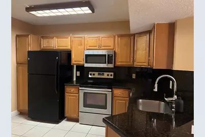 9001  Wiles Rd, Unit #305, Coral Springs, FL 33067 - Photo 2