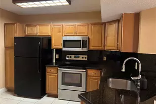 9001 Wiles Rd, Coral Springs, FL 33067 - Photo 2