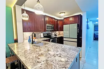 3007 N Oakland Forest Dr, Unit #107, Oakland Park, FL 33309 - Photo 2