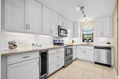 2440  Deer Creek Country Club Blvd, Unit #111C, Deerfield Beach, FL 33442 - Photo 1