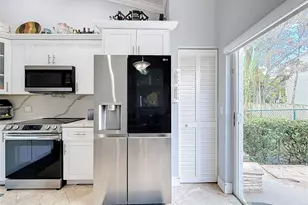 7657 Sanctuary Dr, Coral Springs, FL 33065 - Photo 8