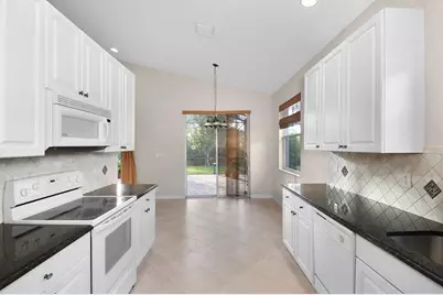 7084 SE Cricket Ct, Stuart, FL 34997 - Photo 12