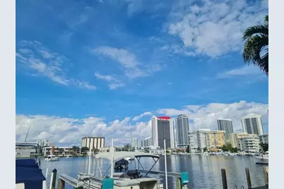 300  Golden Isles Dr, Unit #104, Hallandale Beach, FL 33009 - Photo 2