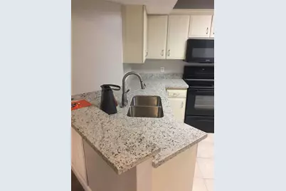 8721  Wiles Road, Unit #102, Coral Springs, FL 33067 - Photo 2