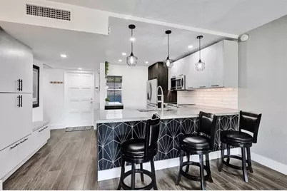 3001 S Course Dr, Unit #107, Pompano Beach, FL 33069 - Photo 2