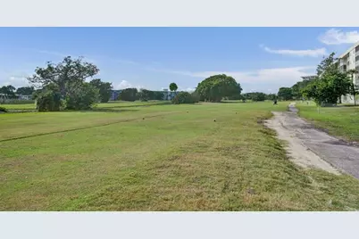 3001 S Course Dr, Unit #107, Pompano Beach, FL 33069 - Photo 12