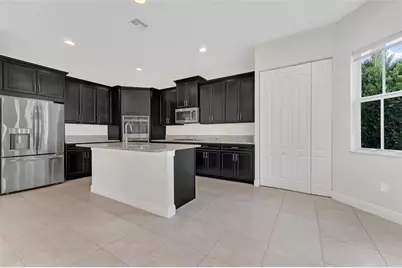 9810 S Miralago Way, Parkland, FL 33076 - Photo 12