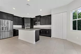 9810 S Miralago Way, Parkland, FL 33076 - Photo 12