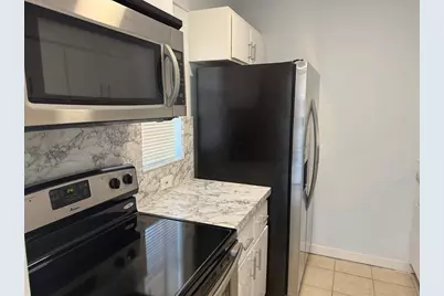 9930 N Twin Lakes Dr, Unit #7-L, Coral Springs, FL 33071 - Photo 4