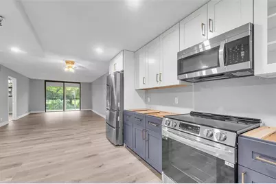 2400  Deer Creek Country Club Blvd, Unit #202, Deerfield Beach, FL 33442 - Photo 4