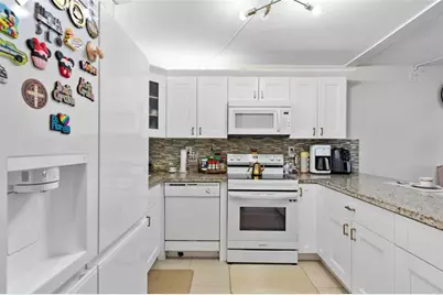 9300 SW 8th St, Unit #102, Boca Raton, FL 33428 - Photo 1