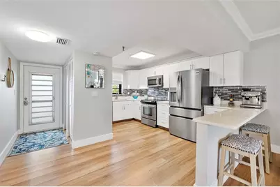 2430  Deer Creek Country Club Blvd, Unit #307, Deerfield Beach, FL 33442 - Photo 2