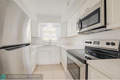 1033 NW 30th Ct - Photo 1
