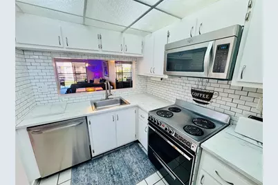 10130 Sunrise Lakes Boulevard #301, Sunrise, FL 33322 - Photo 1