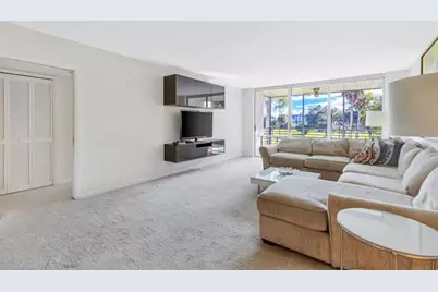 3850 N Oaks Clubhouse Drive #208, Pompano Beach, FL 33069 - Photo 1