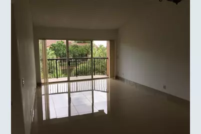 8891  Wiles Rd, Unit #304, Coral Springs, FL 33067 - Photo 1