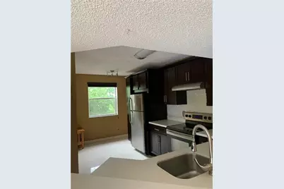 8891 Wiles Road #308, Coral Springs, FL 33067 - Photo 1