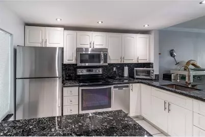 470  Paradise Isle Blvd, Unit #105, Hallandale Beach, FL 33009 - Photo 1