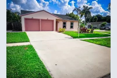 5149 S Canal Cir, Lake Worth, FL 33467 - Photo 1