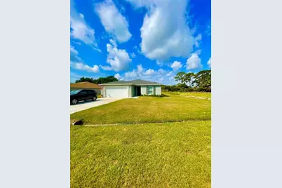 718 NE Perch Ln, Port Saint Lucie, FL 34983 - Photo 1