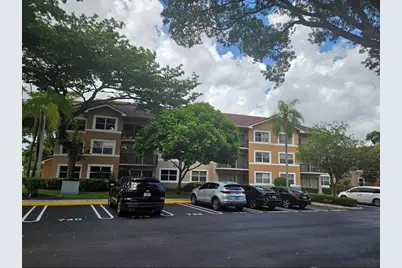 8721 Wiles Road #106, Coral Springs, FL 33067 - Photo 1