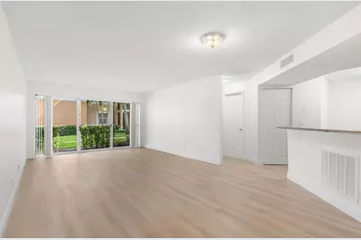 8851 Wiles Road #108, Coral Springs, FL 33067 - Photo 1