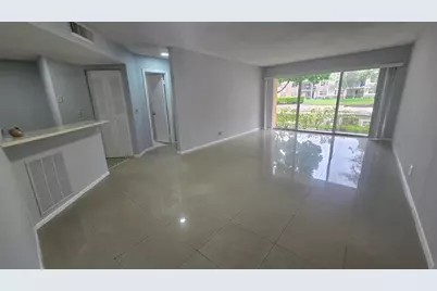 9055  Wiles Rd, Unit #5-106, Coral Springs, FL 33067 - Photo 1