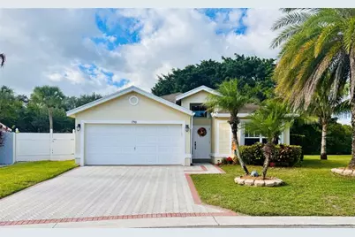 1792  Sawgrass Circle, Greenacres, FL 33413 - Photo 1