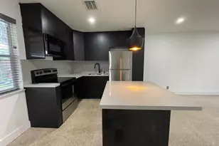 975 NE 40th St, Oakland Park, FL 33334 - Photo 1