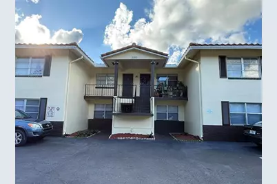 3880 Woodside Drive, Coral Springs, FL 33065 - Photo 1