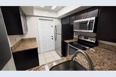 4061 NW 9th Ave, Unit #105, Deerfield Beach, FL 33064 - Photo 1