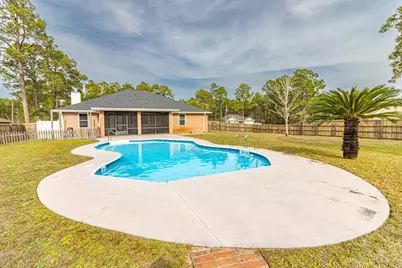 6977 Leisure Street, Navarre, FL 32566 - Photo 1