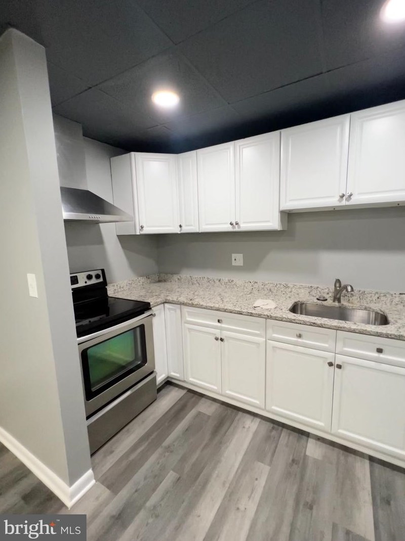 302 E 25th St #1, Baltimore, MD 21218