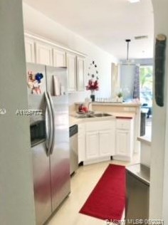 1000 Pipers Cay Dr #119, West Palm Beach, FL 33415