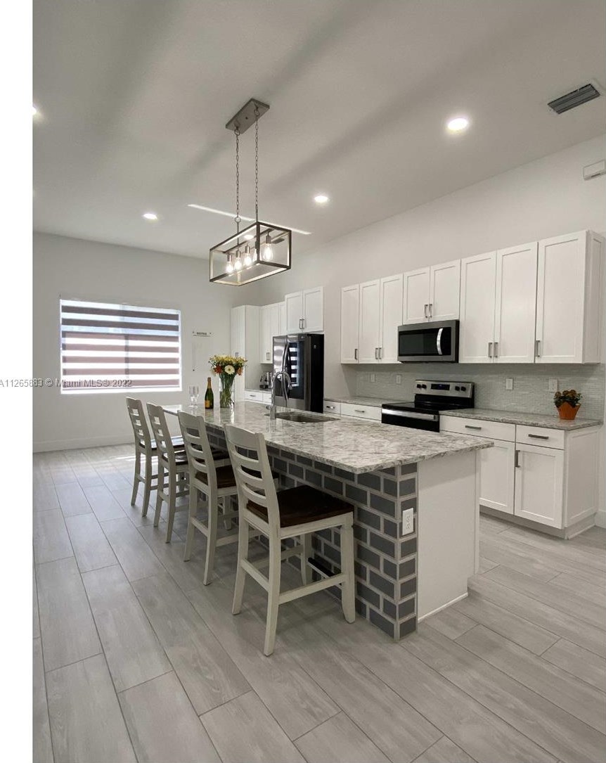 15012 177th Ter, Miami FL  33187-7704 exterior